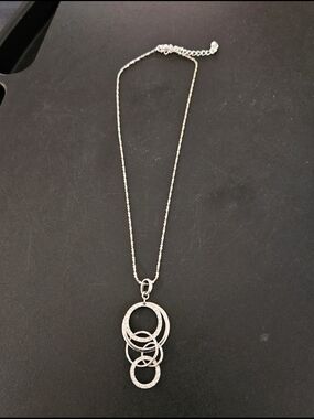 Annaleece silver-tone necklace with dangling circular charms